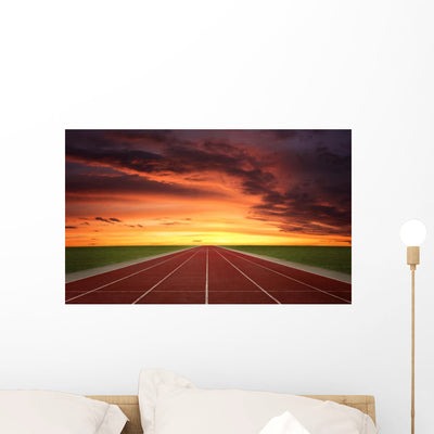 Running Track Sunset Wall Mural shown on a wall
