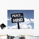 Peace of Mind sign with clouds and sky background Wall Mural