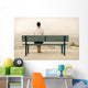 Woman sitting on bench Wall Mural