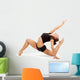 Young professional gymnast woman Wall Decal