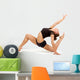 Young professional gymnast woman Wall Decal