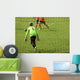 Young boys play football match Wall Mural