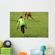 Young boys play football match Wall Mural