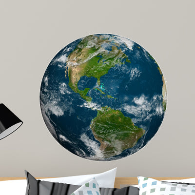 Planet Earth with Clouds Wall Decal shown on a wall