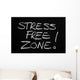 The phrase Stress Free Zone written on a blackboard Wall Mural