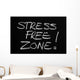The phrase Stress Free Zone written on a blackboard Wall Mural