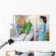 Nurses Looking At Patient Sitting On Cloth Of Hydraulic Lift Wall Mural