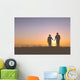 Senior couple holding hands silhouettes Wall Mural