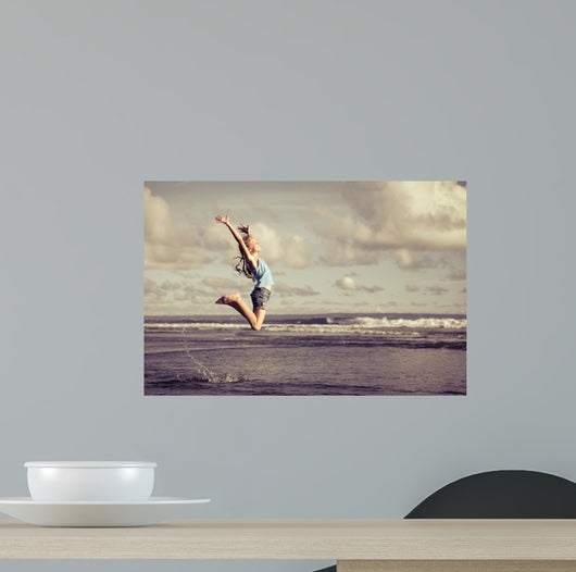 Teen Girl Jumping Beach Wall Decal