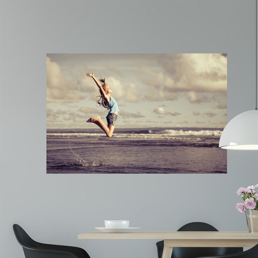 Teen Girl Jumping Beach Wall Decal