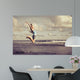 Teen Girl Jumping Beach Wall Decal
