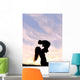 Silhouette of Happy Mother Playing Outside with Baby Wall Mural