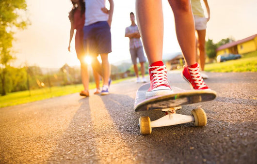 Young Peoples Legs With Skateboard Wall Decal
