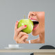 Woman Biting Green Apple Wall Decal