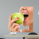 Woman Biting Green Apple Wall Decal