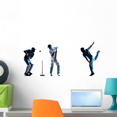 Cricket Players Silhouette Wall Decal shown on a wall