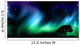 Night sky with norther lights with tree silhouettes Wall Mural
