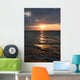 Calm ocean and beach on tropical sunrise Wall Mural