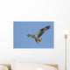 Osprey (pandion haliaetus) In Flight With A Fish Wall Mural