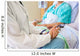 Female Doctor Sitting With Patient On Hospital Bed Wall Mural