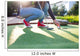 Young woman plays adventure/mini golf in summer evening Wall Mural