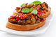 Bruschetta Caponata With Raisins And Pine Nuts Decorated With A Wall Decal