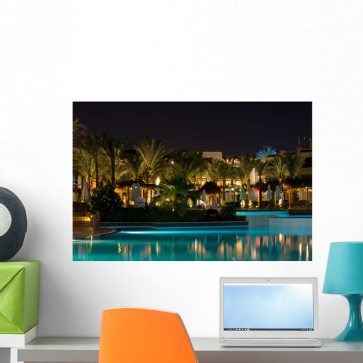 Night swimming pool side of tropical hotel Wall Mural