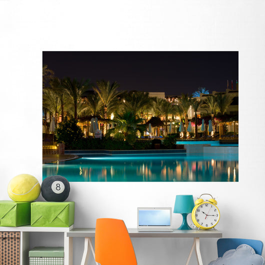 Night swimming pool side of tropical hotel Wall Mural