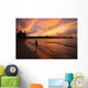 fiery sunset over the water in jamaica Wall Mural
