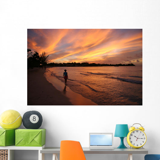 fiery sunset over the water in jamaica Wall Mural