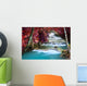 Beautiful waterfall in autumn forest Wall Mural