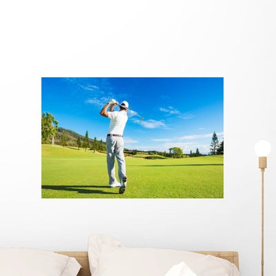 Man Playing Golf Wall Decal 3 shown on a wall