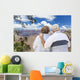 Happy Senior Couple Looking Out Over The Grand Canyon Wall Mural