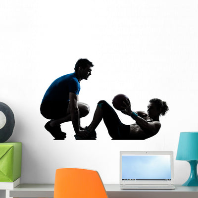 Man Woman Exercising Weights Wall Decal shown on a wall