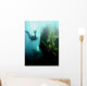 Wreck with sunbeams showing bow of boat and divers Wall Mural