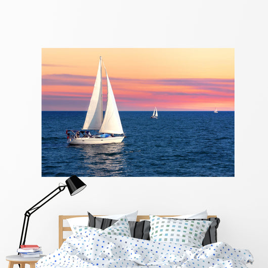 Sailboats at sunset Wall Mural