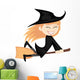 Witches all around - ginger witch girl is riding on a broom Wall Decal