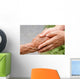 Senior and young holding hands with retro effect Wall Mural