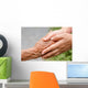 Senior and young holding hands with retro effect Wall Mural