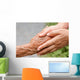 Senior and young holding hands with retro effect Wall Mural