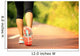 young fitness woman legs walking on forest trail  Wall Mural