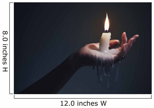 Holding a candle on a dark background. Wall Mural