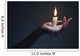 Holding a candle on a dark background. Wall Mural