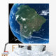 South America as seen from space with cloud formations Wall Mural