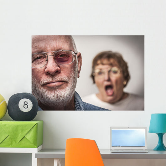 Battered and Scared Man with Screaming Woman Behind Wall Mural