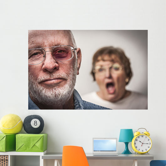 Battered and Scared Man with Screaming Woman Behind Wall Mural