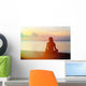 woman meditation on the beach Wall Mural