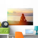woman meditation on the beach Wall Mural