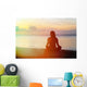 woman meditation on the beach Wall Mural