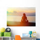woman meditation on the beach Wall Mural